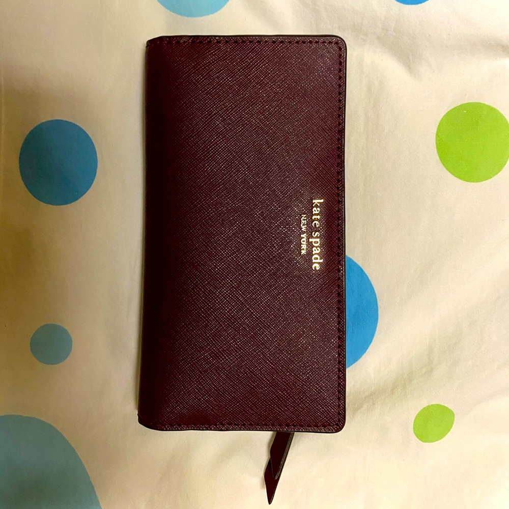 Kate spade plum light wallet.